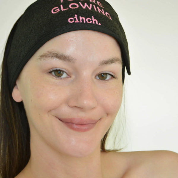 Girl wearing Cinch Skin Terry Towelling Headband. Text reads: you're glowing