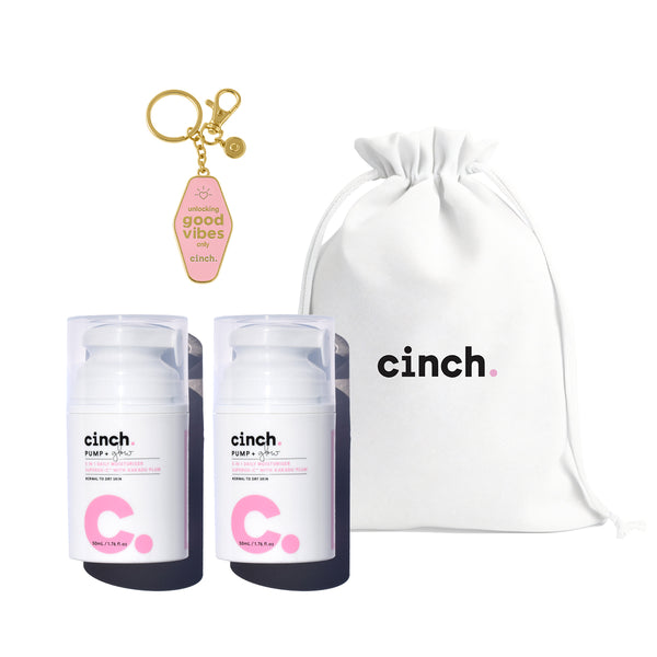 Limited edition Pump + Glow skincare bundle featuring two full-size illuminating moisturisers, a white cotton Cinch Skin bag, and a Good Vibes key ring—your go-to set for glowy, nourished skin in seconds, with or without the full routine.