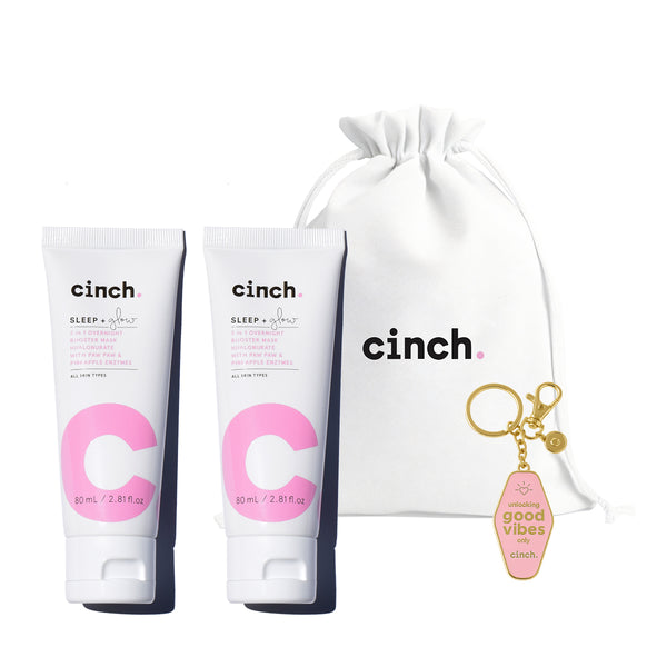 Limited edition Sleep + Glow skincare bundle with two full-size overnight hydrating mists, a white cotton Cinch logo bag, and a Good Vibes key ring—designed for glowing, bouncy skin by morning and perfect for gifting or stocking up.