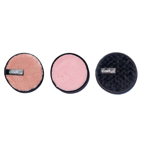Three pink Wipe + Glow reusable face pads, double-sided for gentle daily cleansing, makeup removal, and light exfoliation.