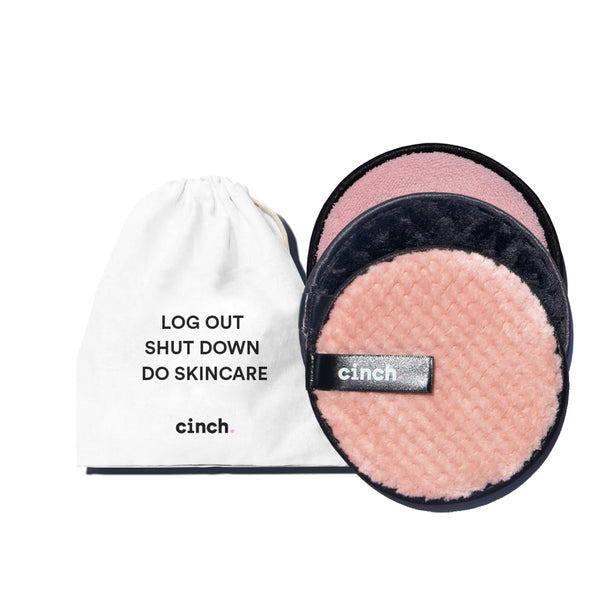 Set of 3 pink Wipe + Glow reusable face pads with wash cloth, double-sided for gentle makeup removal and exfoliation, ideal for daily cleansing routines.
