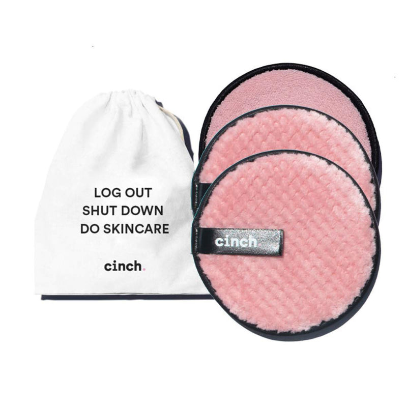 Set of 3 pink Wipe + Glow reusable face pads with wash cloth, double-sided for gentle makeup removal and exfoliation, ideal for daily cleansing routines.