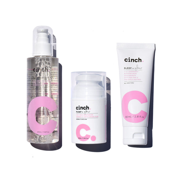 Cinch The Ultimate Glow Set, cleanse + glow micellar, pump + glow moisturiser, sleep + glow night booster with white background